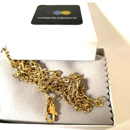 14K gold-filled Figaro chain necklace in a gift box, showcasing its elegant design and shiny finish.