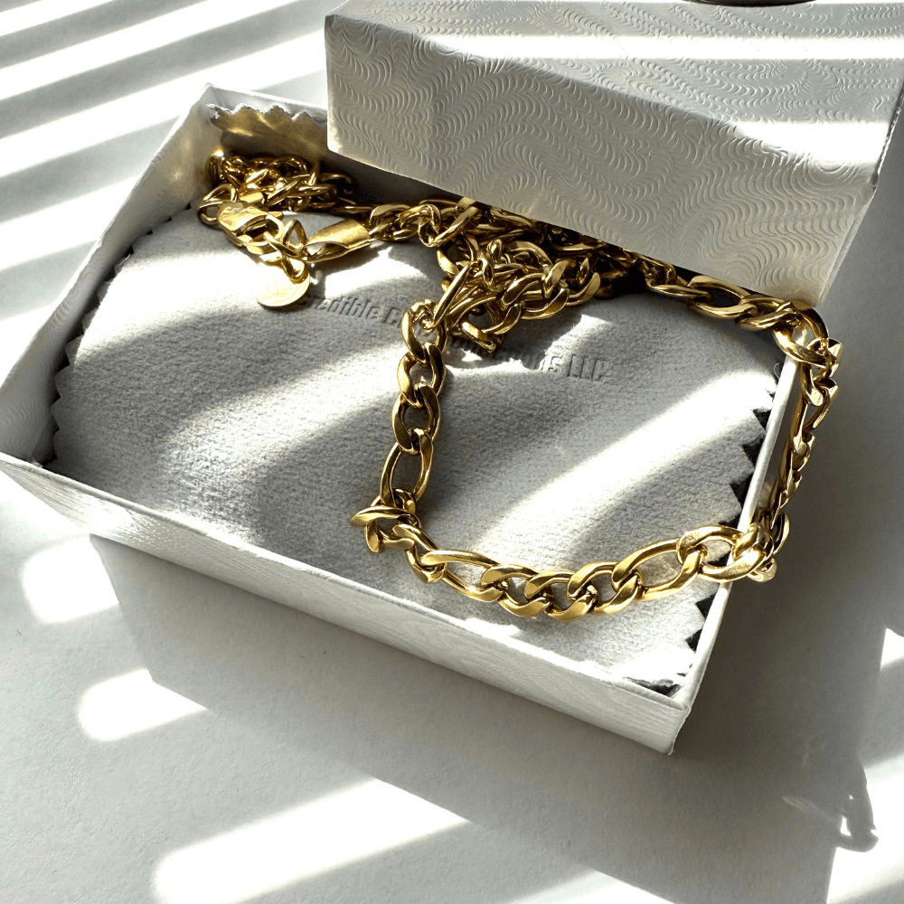 14k gold-filled Figaro chain necklace in elegant gift box with soft fabric lining.