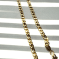 Load image into Gallery viewer, 14k gold filled Figaro chain necklace, showcasing elegant shine and bold links in a stylish design.
