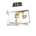 Load image into Gallery viewer, 24k yellow gold filled crucifix necklace showcased in a gift box with a white interior.

