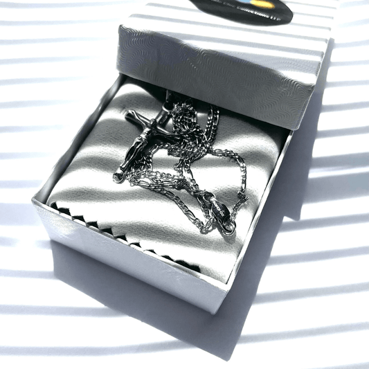 14k white gold crucifix necklace for men and women displayed in elegant gift box with satin lining.