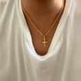 Load image into Gallery viewer, Gold-filled rope chain necklace with small cross pendant worn over a white shirt.
