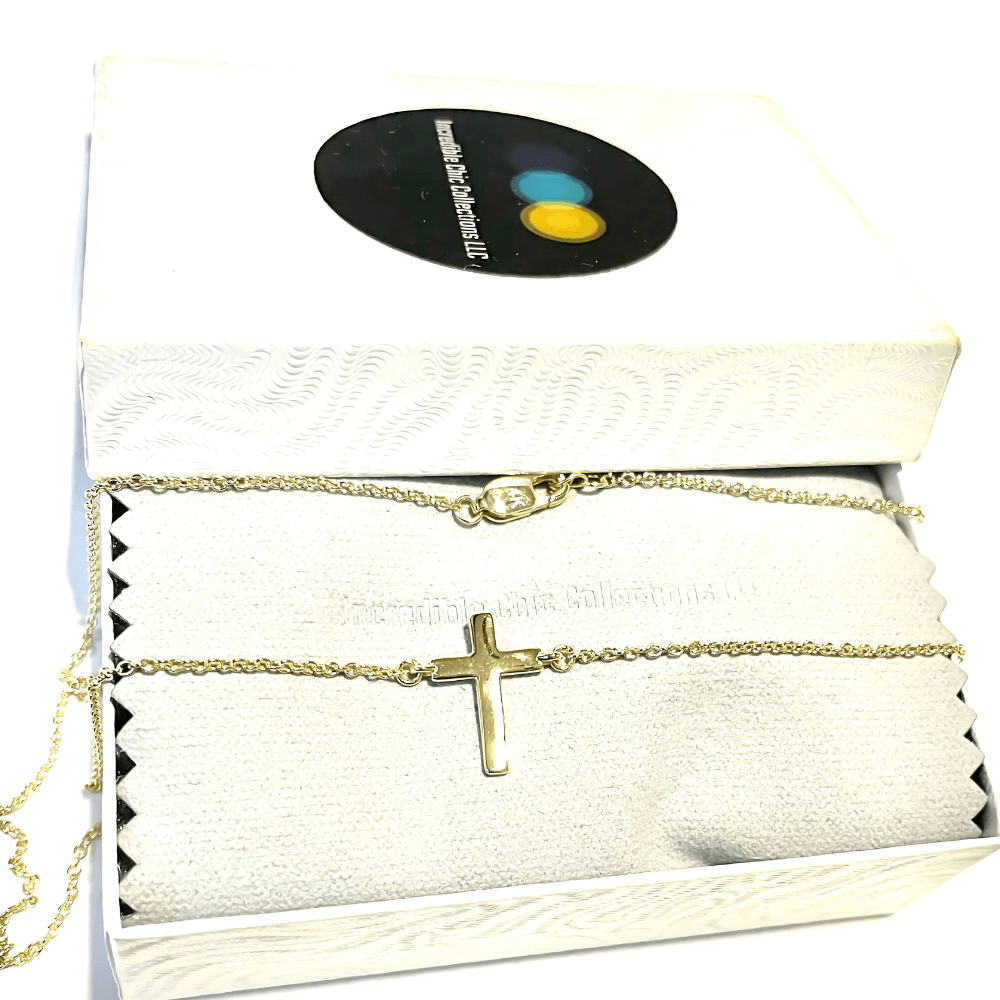 Solid 14k gold cross necklace in elegant packaging, perfect for gifting and everyday wear.