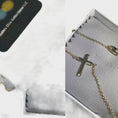 Load and play video in Gallery viewer, Incredible Chic 14k gold cross necklace displayed in gift box, perfect for layering and everyday wear.
