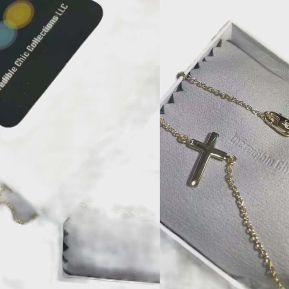 14k gold cross necklace displayed in elegant packaging, perfect for layering and as a gift for special occasions.