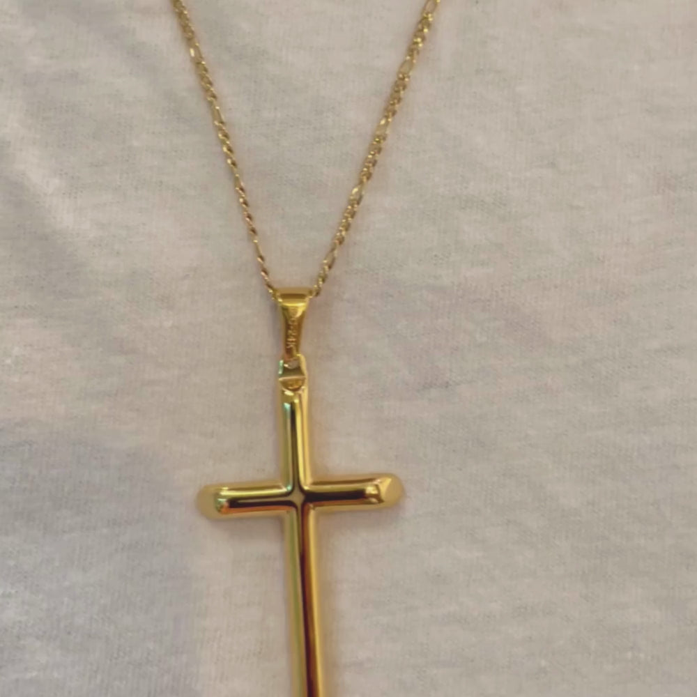 Video of 24k gold overlay Figaro chain cross pendant necklace for men and women, featuring a solid plated clasp.